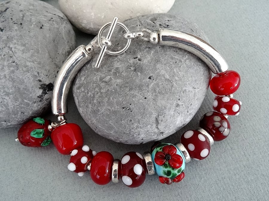 SALE!! was 15 pounds now 12 pounds Handmade Lampwork bead and ceramic bracelet