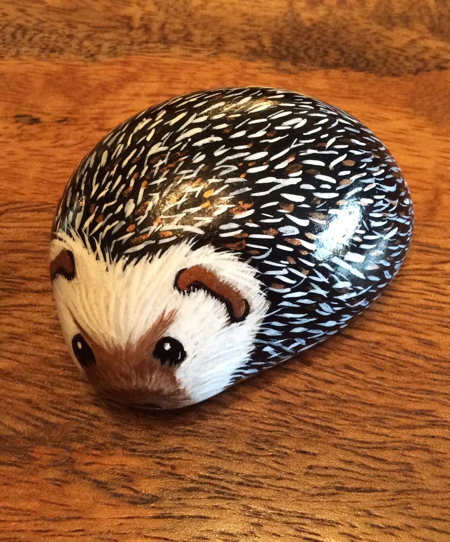 Hedgehog hand painted on stone