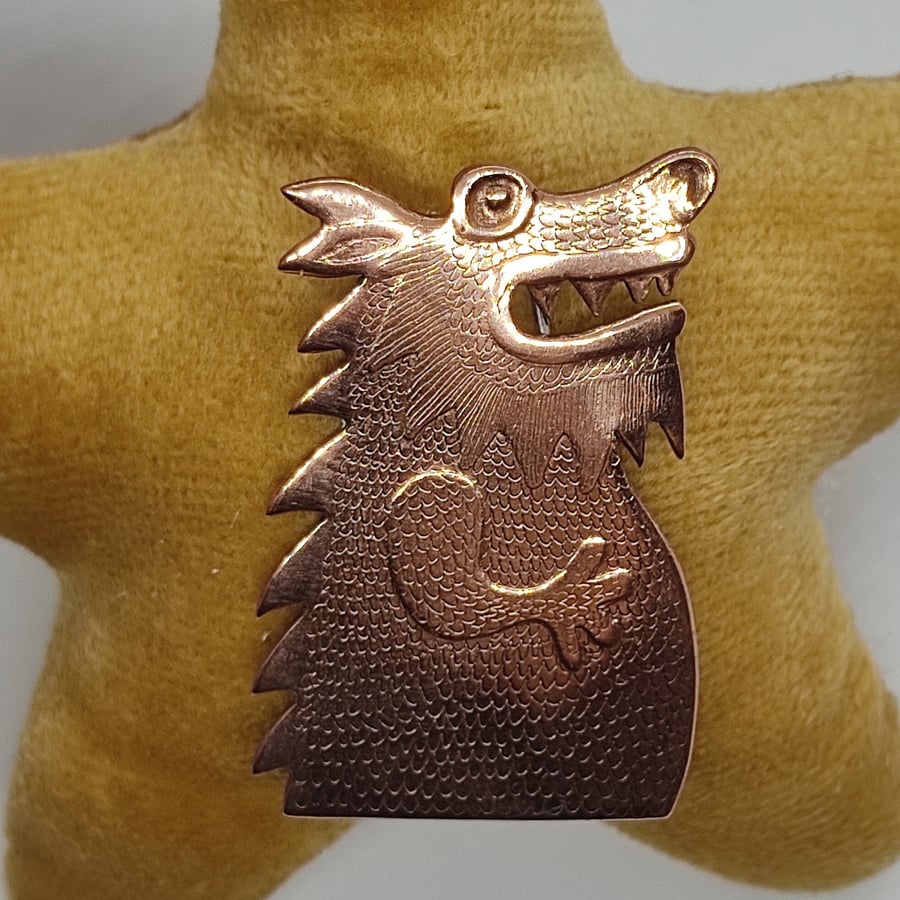 Copper dragon brooch