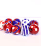 Handmade red, white and blue patterned lampwork glass beads - Image 2