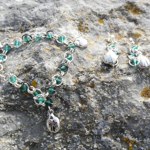 Lady Bug Charm Bracelet and earrings