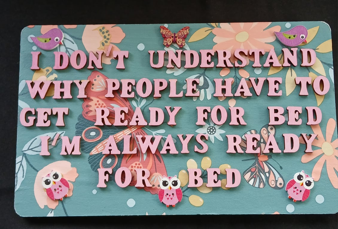 Hand decorated hanging wooden sign 