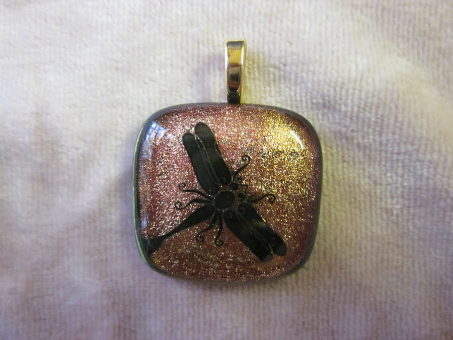 Handmade dichroic glass cabochon pendant - salmon with black enamel dragonfly