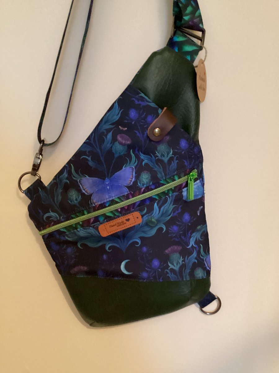 Crossbody sling bag, traveller pouch.