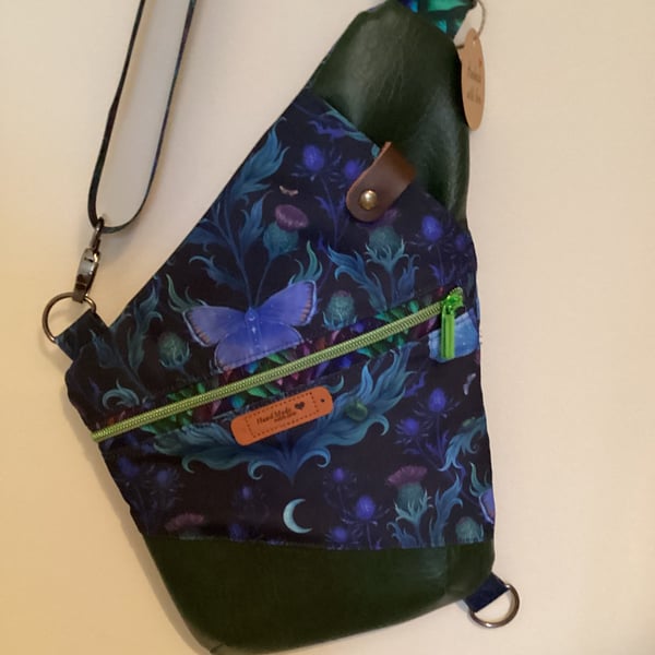 Crossbody sling bag, traveller pouch.