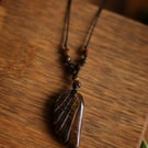 Handmade macrame necklace with Tiger Eye feather
