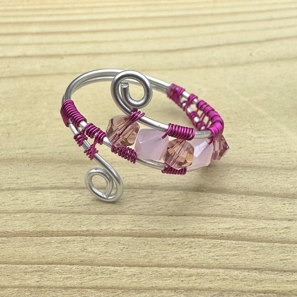 Pink and silver beaded wire ring