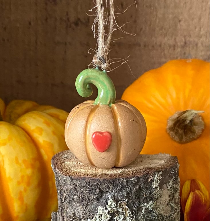 Tiny hanging ceramic pumpkin decoration red heart