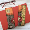 Embroidered up-cycled gold Klimt style bookmarks. 