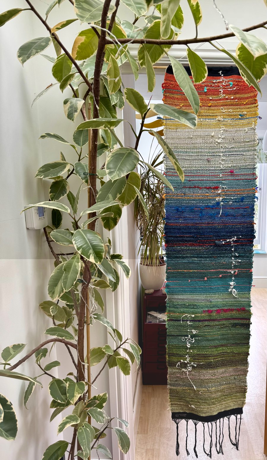 Orange to green saori wall hanging