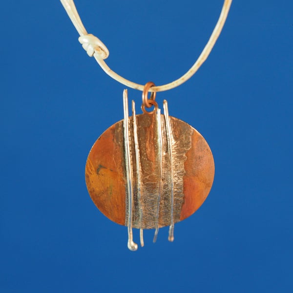 Falling Rain Circular Copper and Silver Pendant