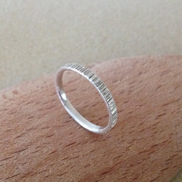 Sterling silver vertical cut textured ring band