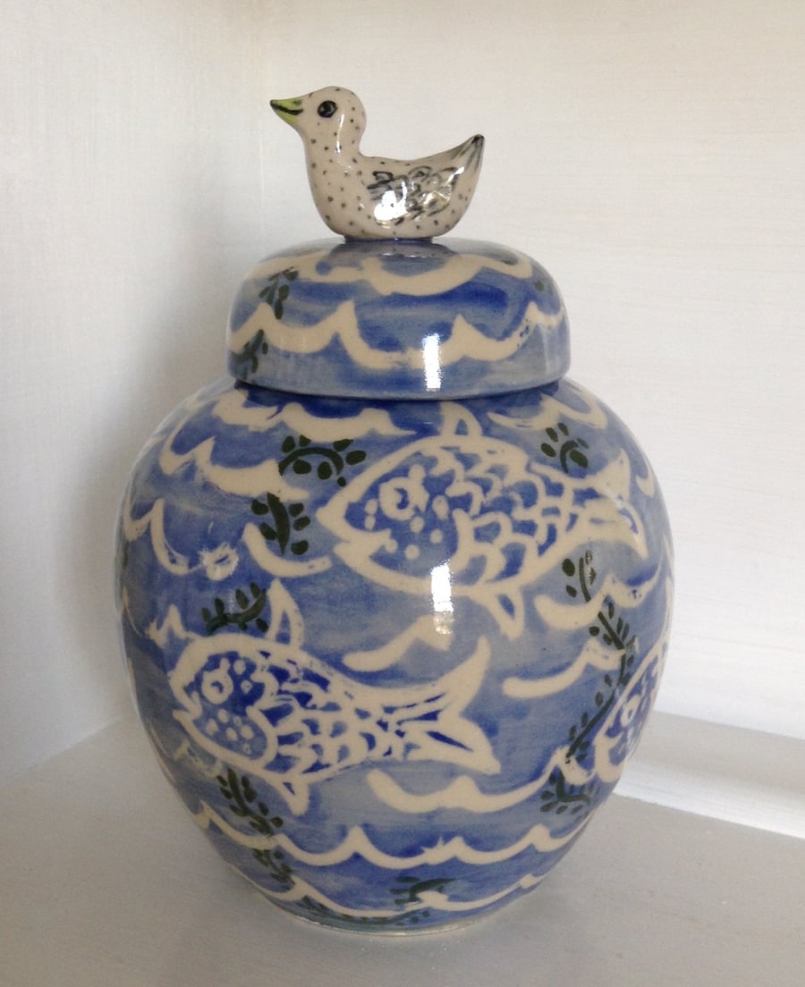 Blue ginger jar with bird top