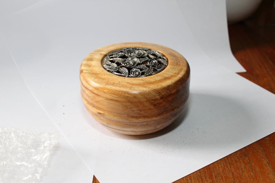 pot puri holder or Bowl turned from beech with a lift off pewter lid.