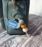 Powered by Tea Bag Charm Keyring - Image 1