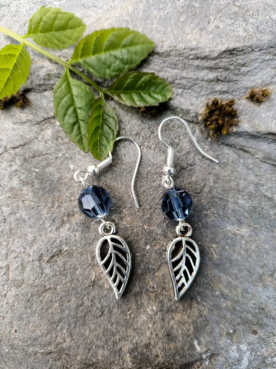 Denim Blue crystal drop earrings with silver leaf designs