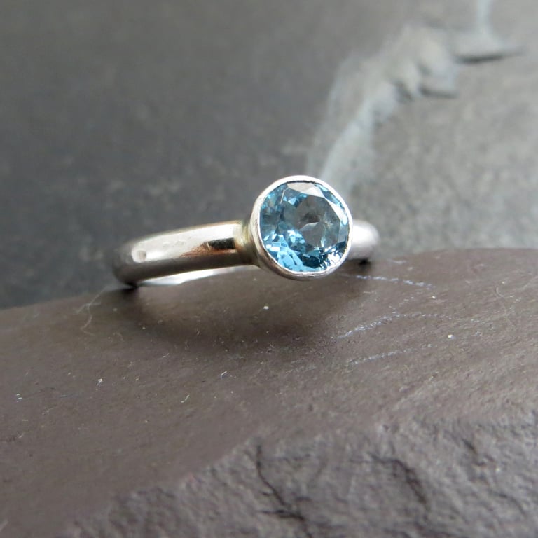 Blue topaz and silver solitaire ring, November birthstone jewellery