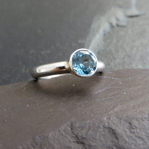 Blue topaz and silver solitaire ring, November birthstone jewellery