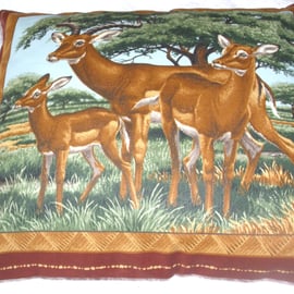 On Safari Gazelles under trees cushion