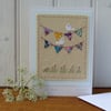 Hand-stitched mini bunting, little white doves, pretty card to keep!