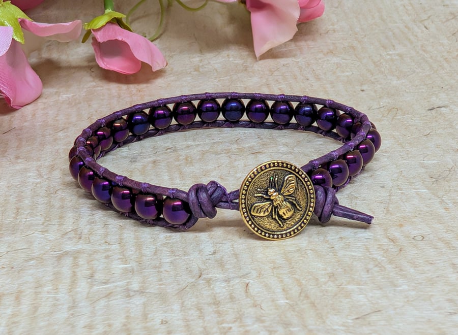 Purple hematite and leather bracelet with bee button fastener 