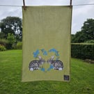 Rabbits in forget-me-not heart tea towel design, organic cotton, hanging loop