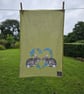 Rabbits in forget-me-not heart tea towel design, organic cotton, hanging loop - Image 1