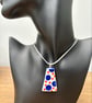 Handmade porcelain navy and orange pendant on a pale blue grey cord necklace