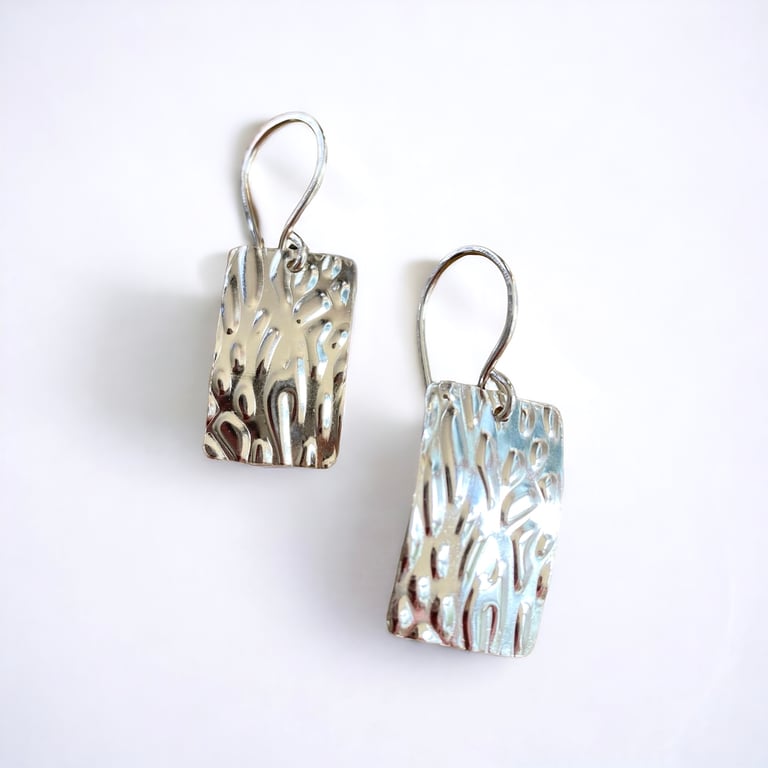 Sterling silver textured earrings. 