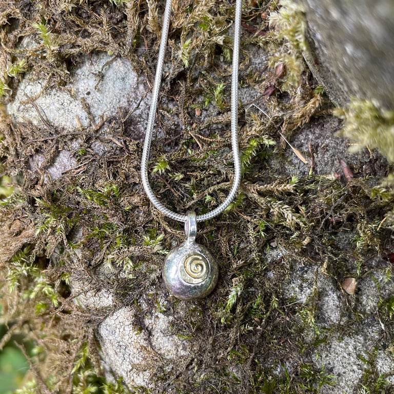 Silver and 18ct gold spiral pebble pendant and chain