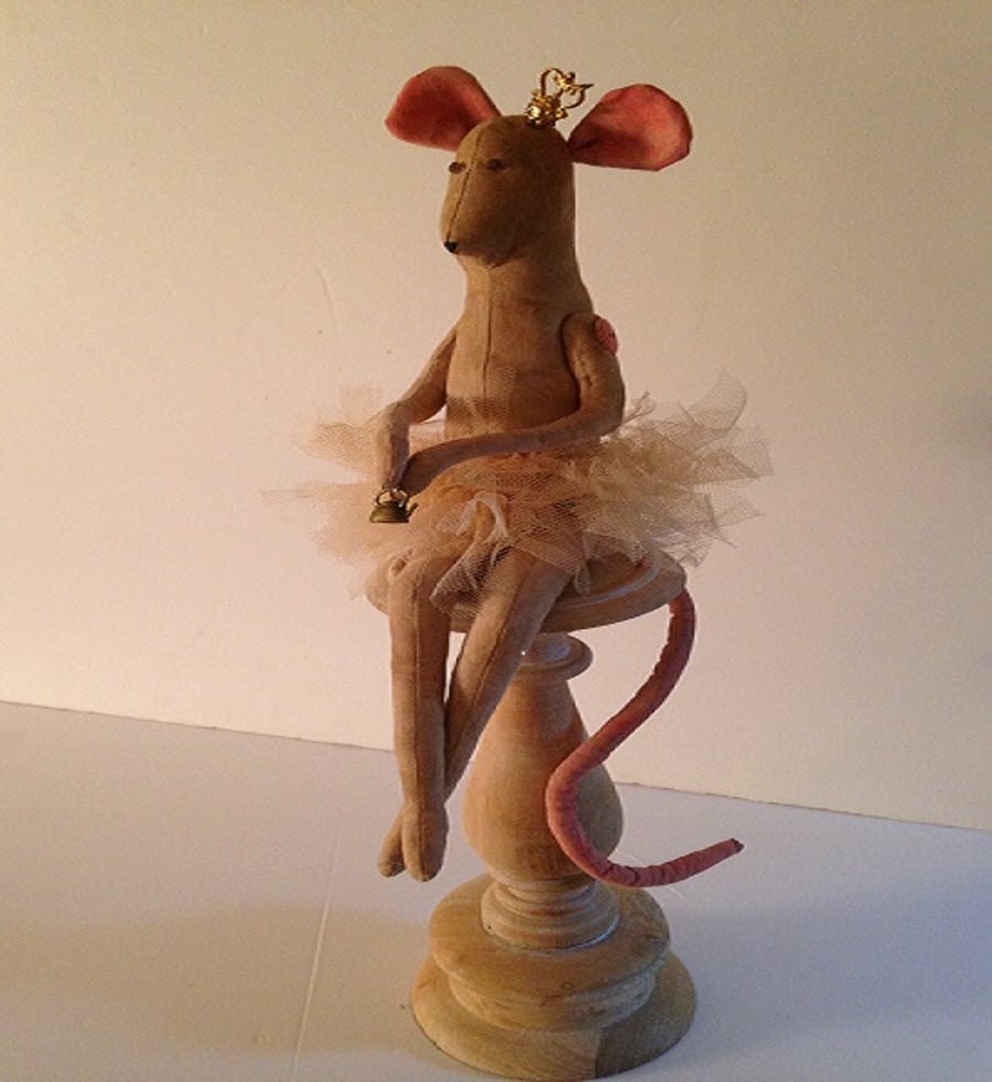 "Raggedy Princess mouse" textile mouse on wood base.