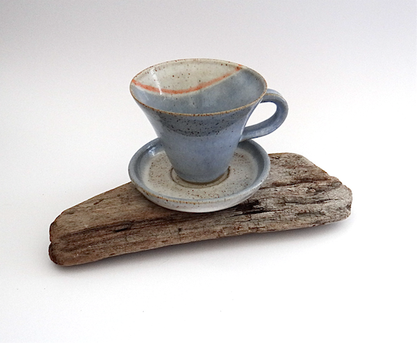 Ceramic cup and saucer in subtle shades of blue and cream - handmade pottery