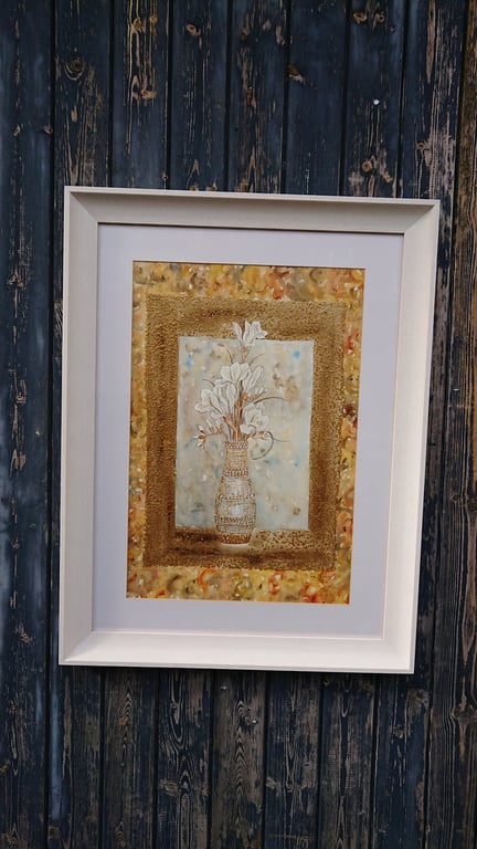 White freesia painting in gilt vase with gold decorative work border.