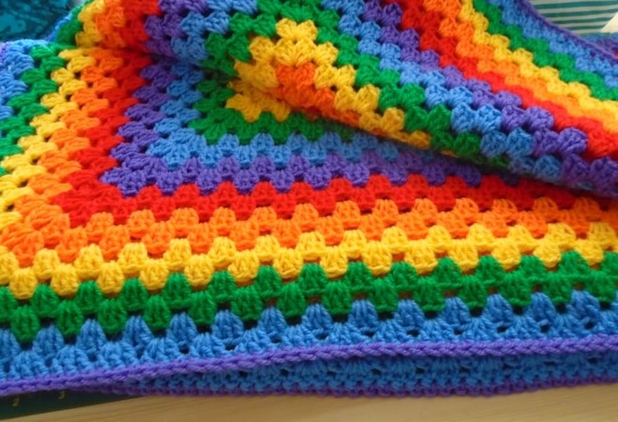 Rainbow granny square crochet throw