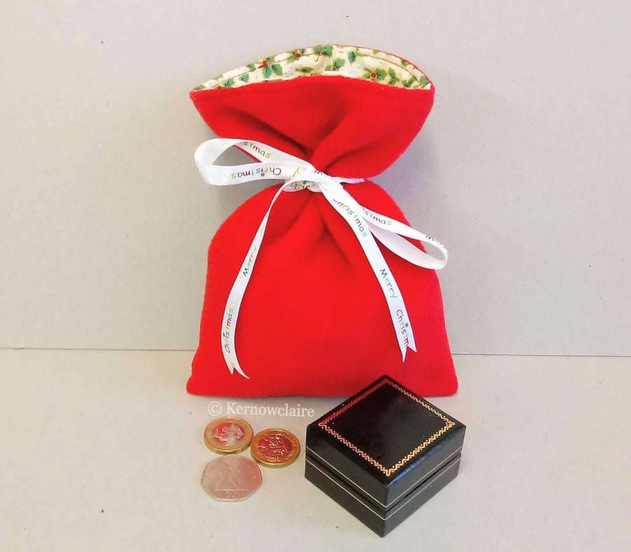 Christmas gift bag in red fleece