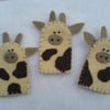 Cow finger puppets