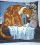 A lovely Ginger and white cat sitting with a vase of flowers cushion - Image 1