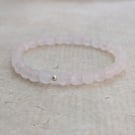 Rose quartz gemstone and sterling silver stretch bracelet 