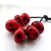 red and black spot lampwork glass beads