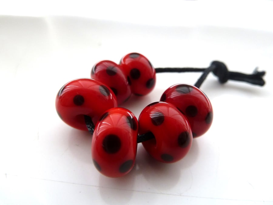 red and black spot lampwork glass beads