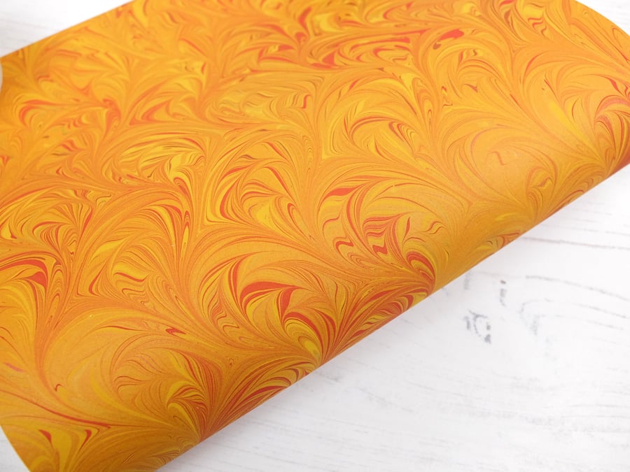 A4 Marbled paper sheet orange red tornado pattern very slight second