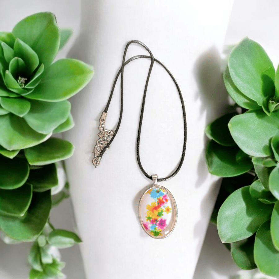 Stocking filler Necklace with colourful flowers in an oval cabochon 