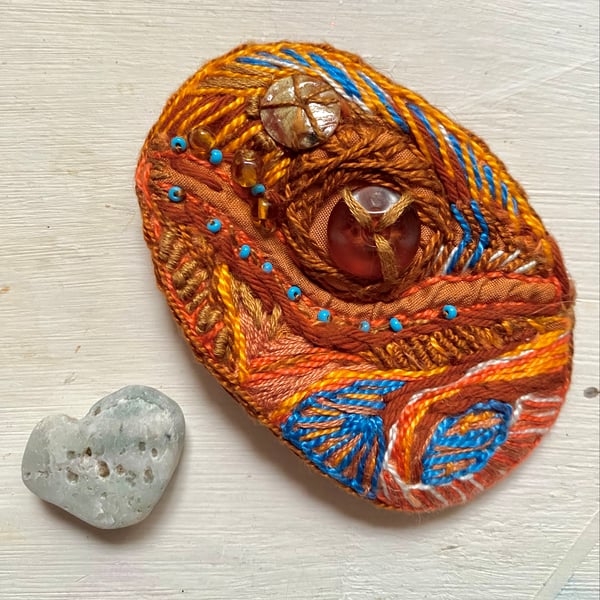 Abstract design,embroidered bronze and azure brooch