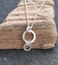 Silver Ring Necklace Pendant, Hammered Silver with Shimmer Texture - Image 9