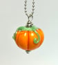 Handmade Halloween pumpkin bead on a Stirling silver chain