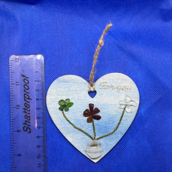 Wooden heart with 'for you' sentiment and sea glass flowers.