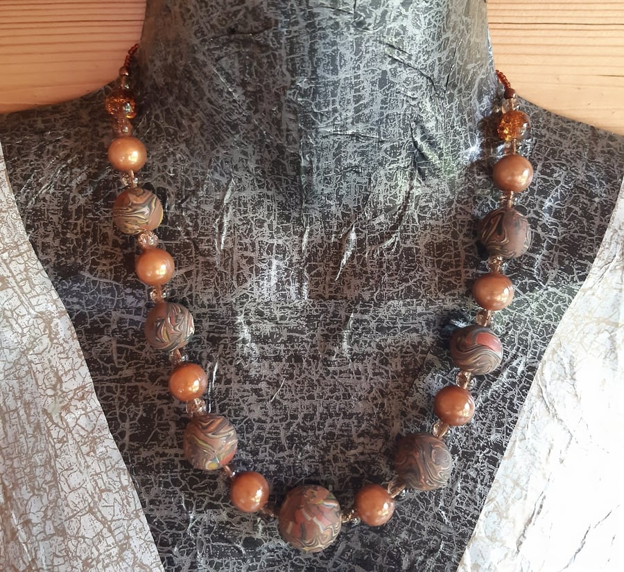 Conker brown, black and gold handmade polymer clay necklace