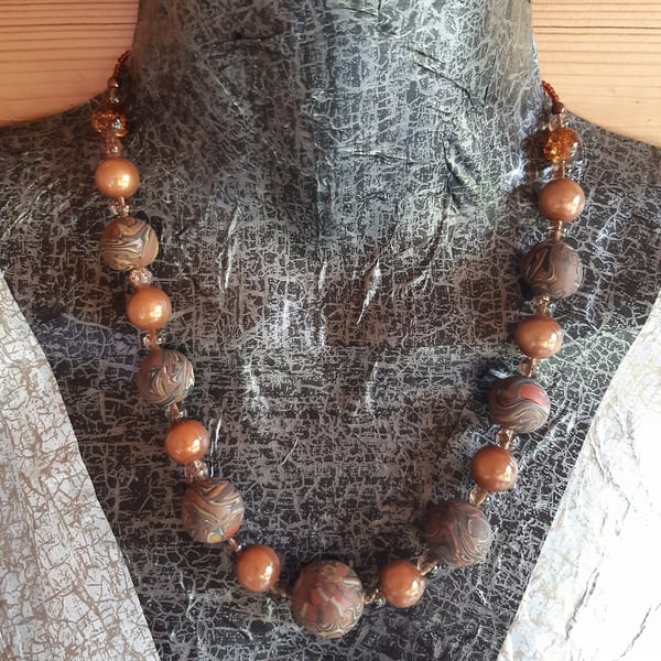 Conker brown, black and gold handmade polymer clay necklace