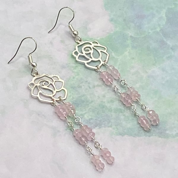 Silver tone filigree rose dangle earrings with rose quartz stones