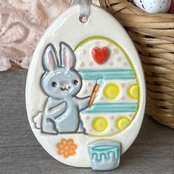 Pottery Easter Egg decoration with painting bunny